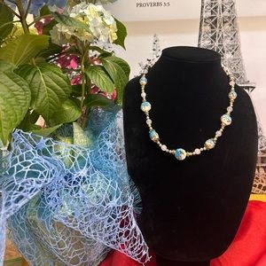 Vintage necklace with pink, gold and blue pearls